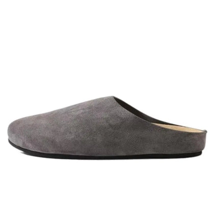 Uma Women's Suede Slippers - shown in use