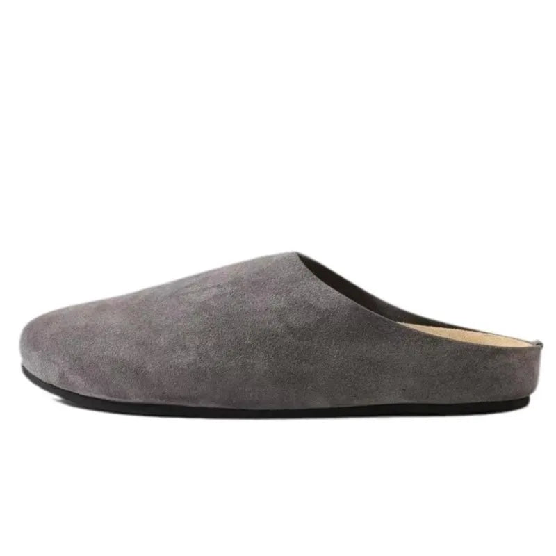 Uma Women's Suede Slippers - shown in use