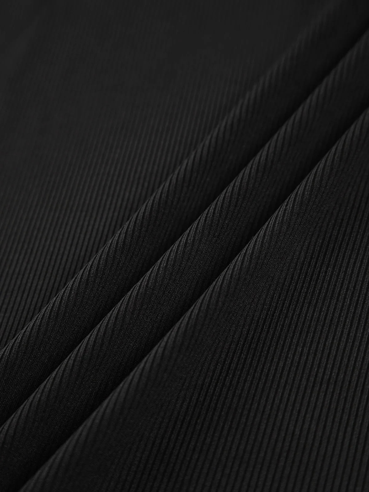 Ava Women's Asymmetric Top - close-up detail
