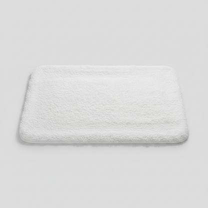 Ultra-Soft Plush Bath Rug in White on clean premium background