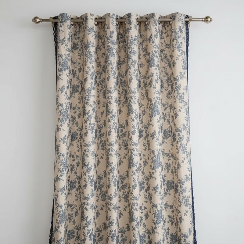 Maribelle vintage navy floral toile curtain panel with navy crochet lace edge trim, hung and shown clearly