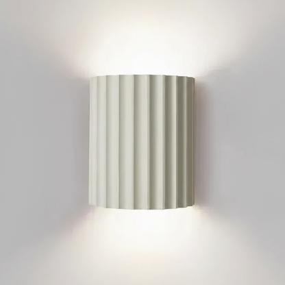 VaultGlow white fluted resin wall sconce studio packshot