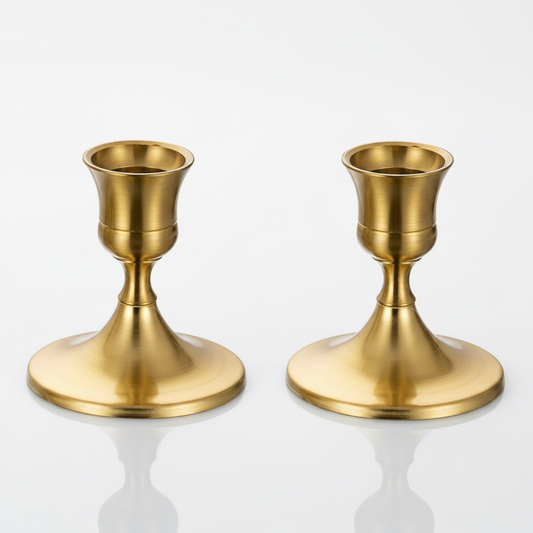 Shimmering Vintage Taper Candle Holders Antique Gold set of 2 studio packshot