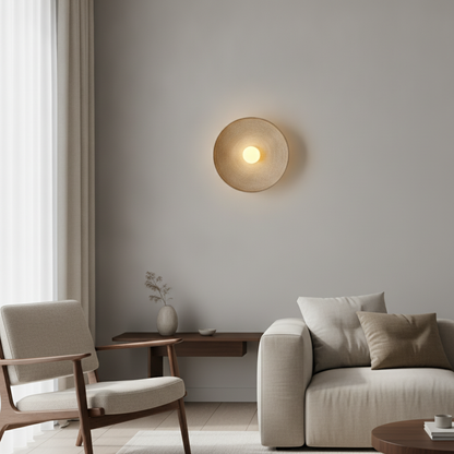 NovaSphere textured wall sconce mounted in a modern living room