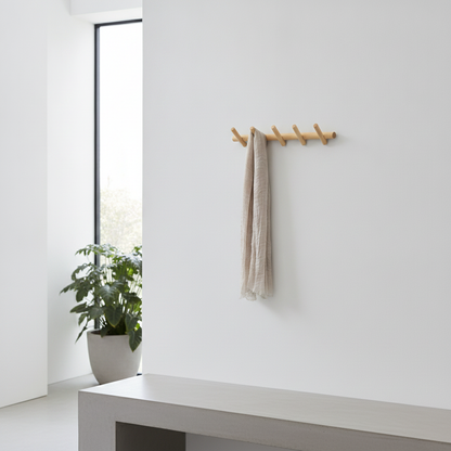 Solid Oak Wall Coat Rack mounted in a modern entryway lifestyle