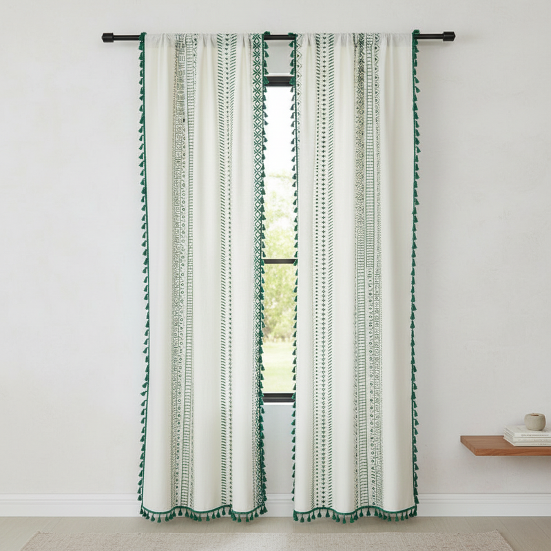 Emerald Tribe Boho Tassel Curtain hung on a window in a styled room