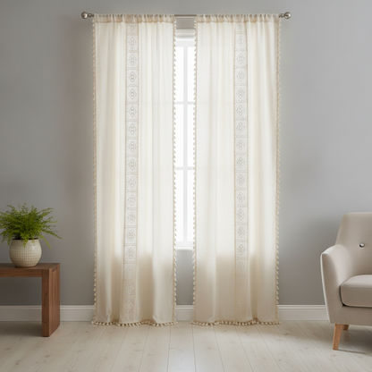 Boho Linen Curtain hung on a window in a styled room